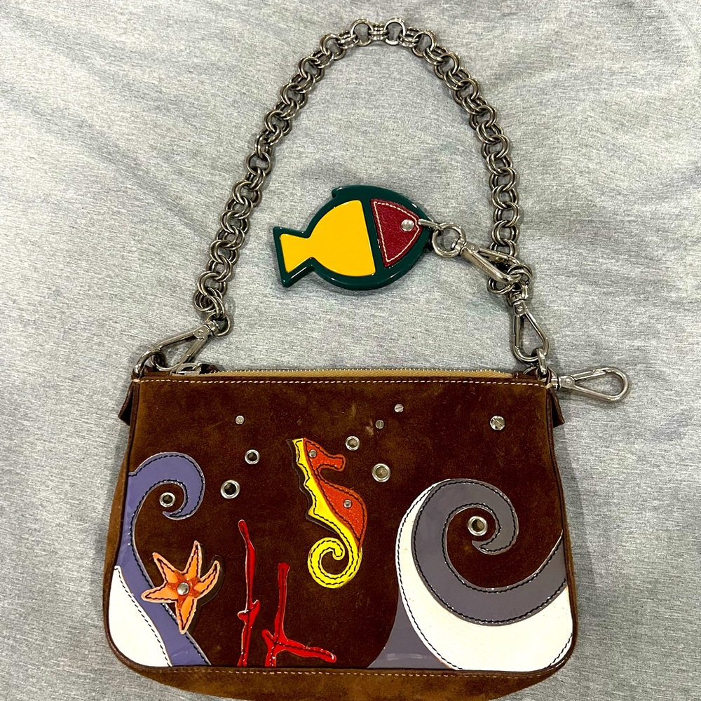 Vintage Brown Suede Authentic Prada seahorse motif bag with fish keychain.